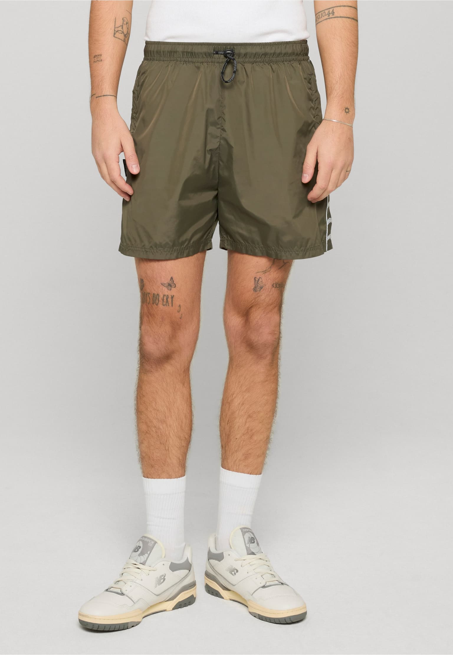 UNFAIR ATHLETICS Curved Tape Trackshorts