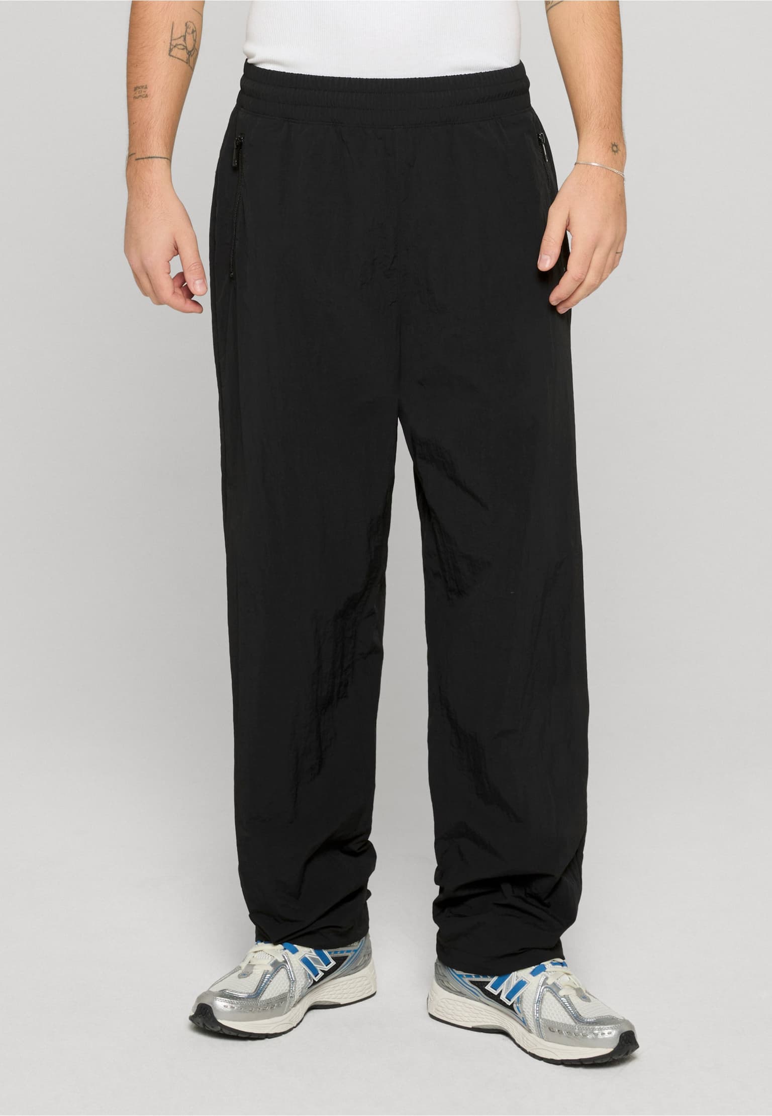 UNFAIR ATHLETICS Curved Crushed Nylon Trackpants